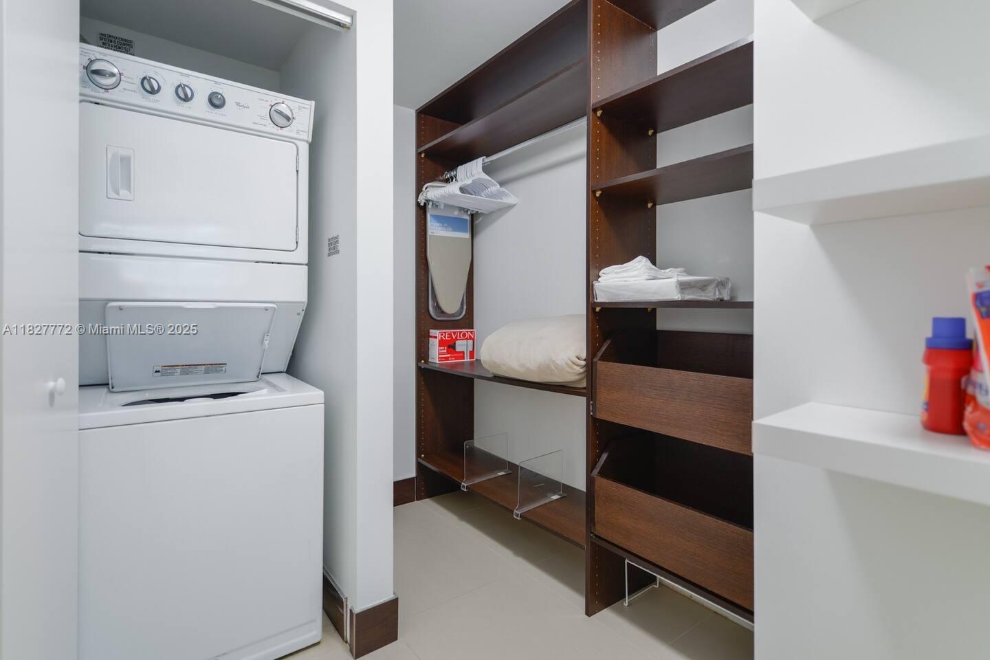 Brickell Miami, FL 33130 - Photo 18 of 26 a utility room with dryer and washer