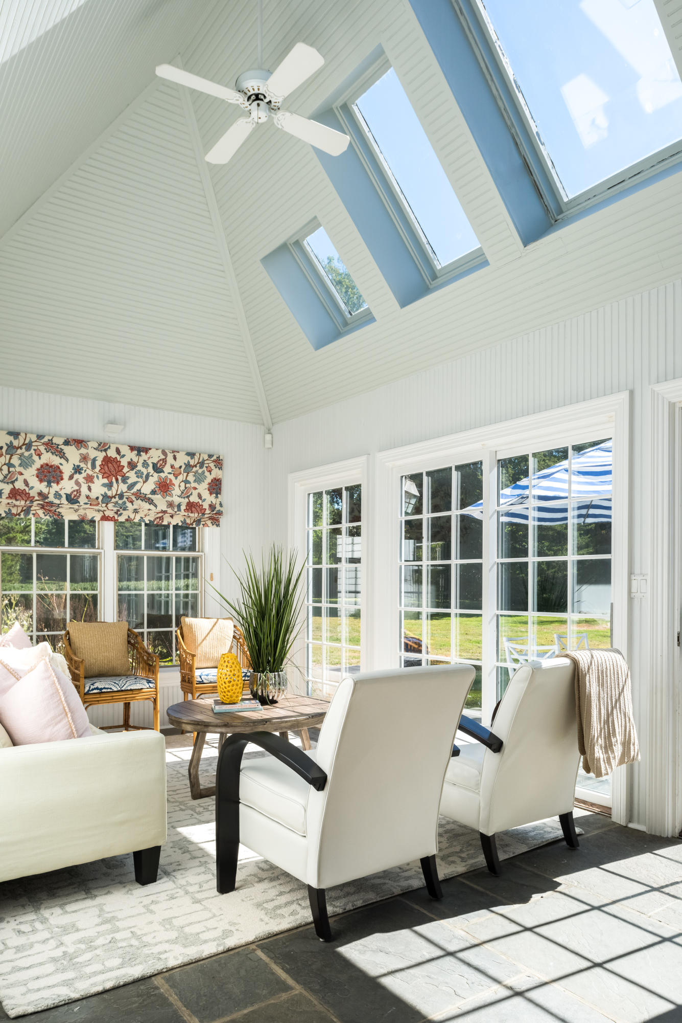 860 Hollow Tree Ridge Road Darien, CT 06820 - Photo 11 of 23 a living room with furniture floor to ceiling window and potted plants