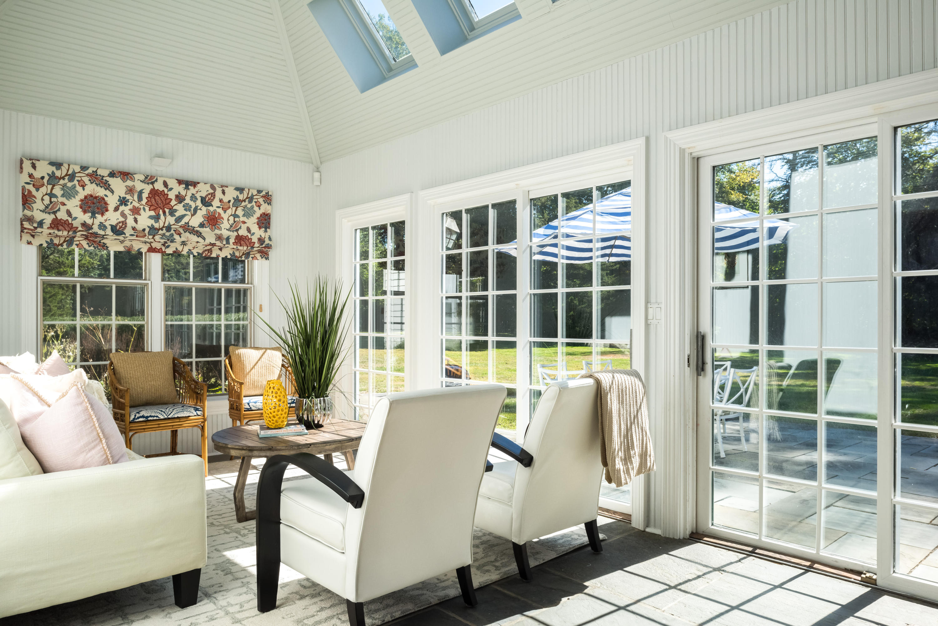 860 Hollow Tree Ridge Road Darien, CT 06820 - Photo 12 of 23 a living room with furniture and a window