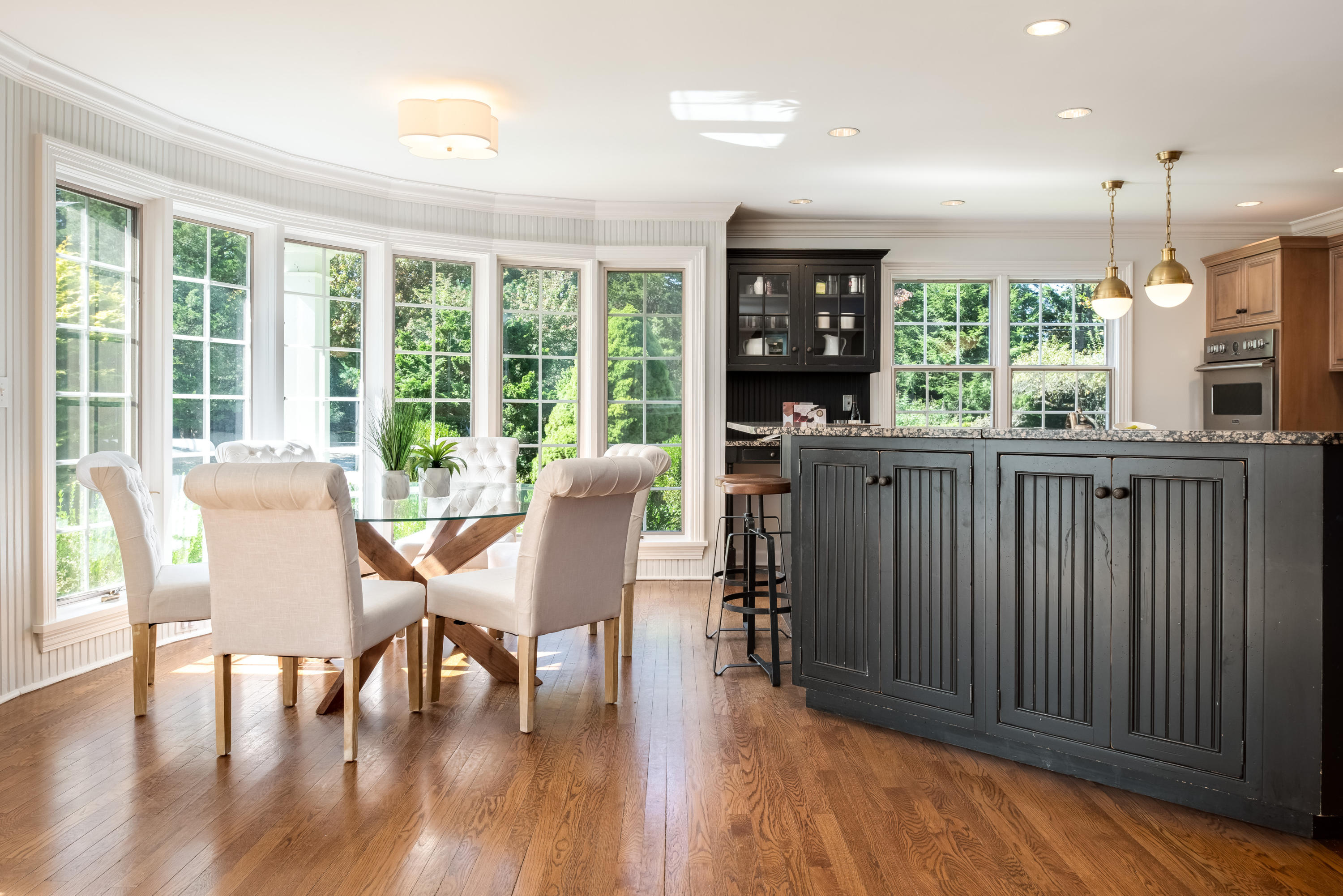 860 Hollow Tree Ridge Road Darien, CT 06820 - Photo 9 of 23 a view of a dining room with furniture and window