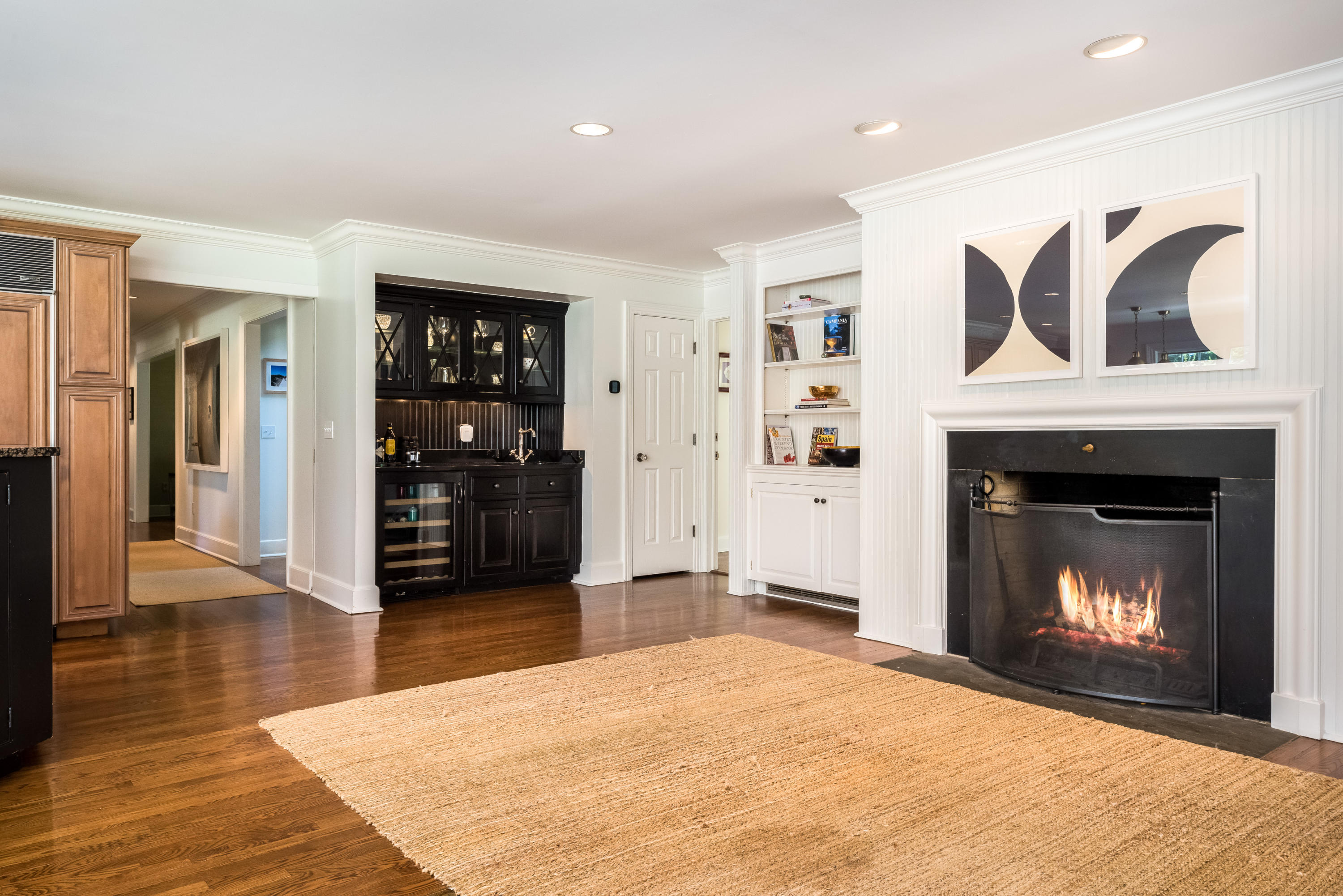 860 Hollow Tree Ridge Road Darien, CT 06820 - Photo 10 of 23 a view of an empty room with furniture and a fireplace