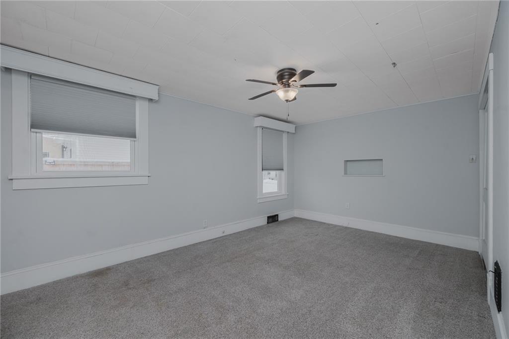 933 Oak Street Indiana, PA 15701 - Photo 12 of 28 a view of an empty room with a fan