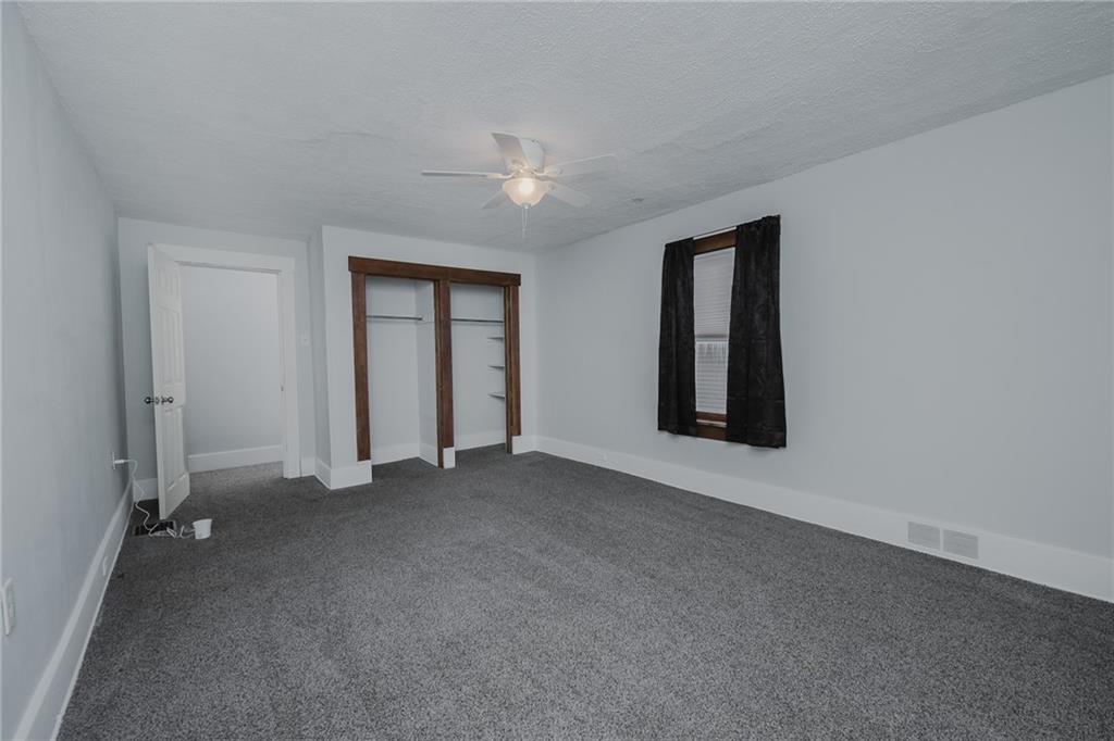 933 Oak Street Indiana, PA 15701 - Photo 13 of 28 an empty room with windows and closet