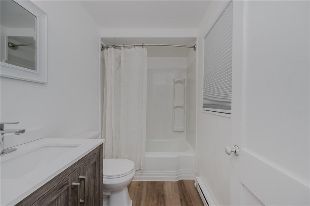 933 Oak Street Indiana, PA 15701 - Photo 15 of 28 a bathroom with a sink a toilet and shower