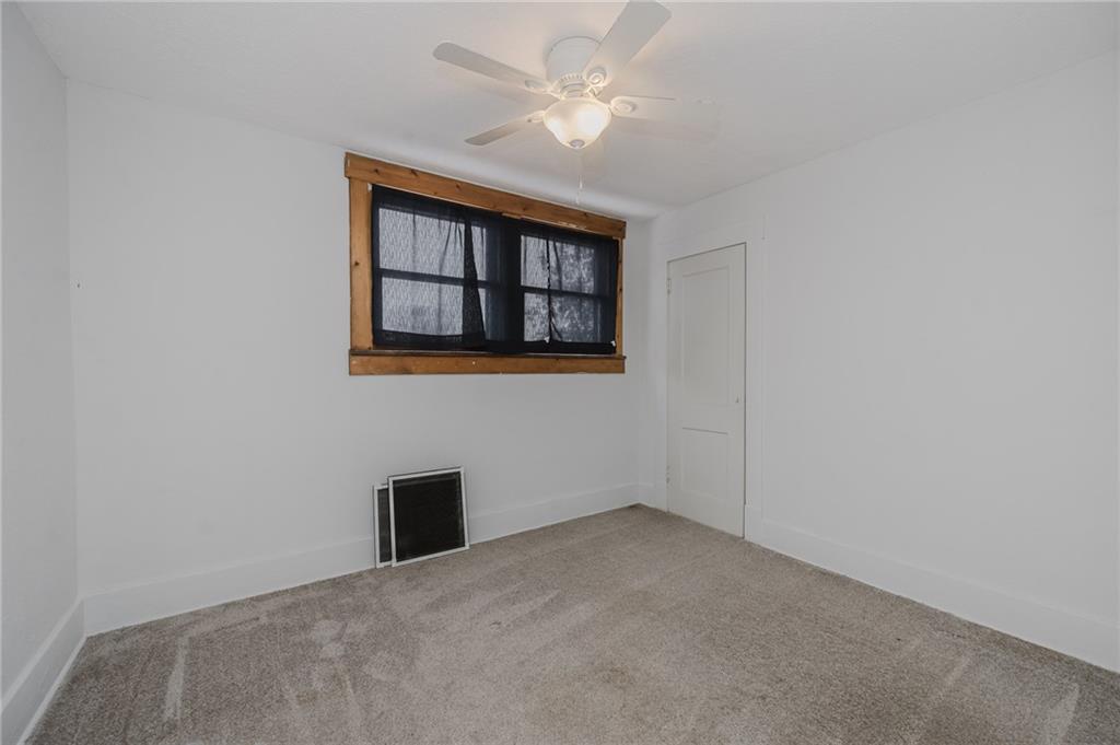 933 Oak Street Indiana, PA 15701 - Photo 17 of 28 an empty room with windows and fan