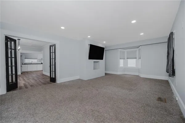 a view of a livingroom with a fireplace