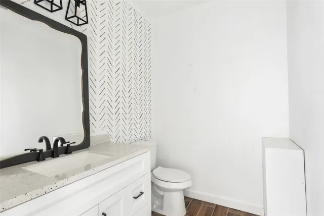 a bathroom with a sink and a toilet