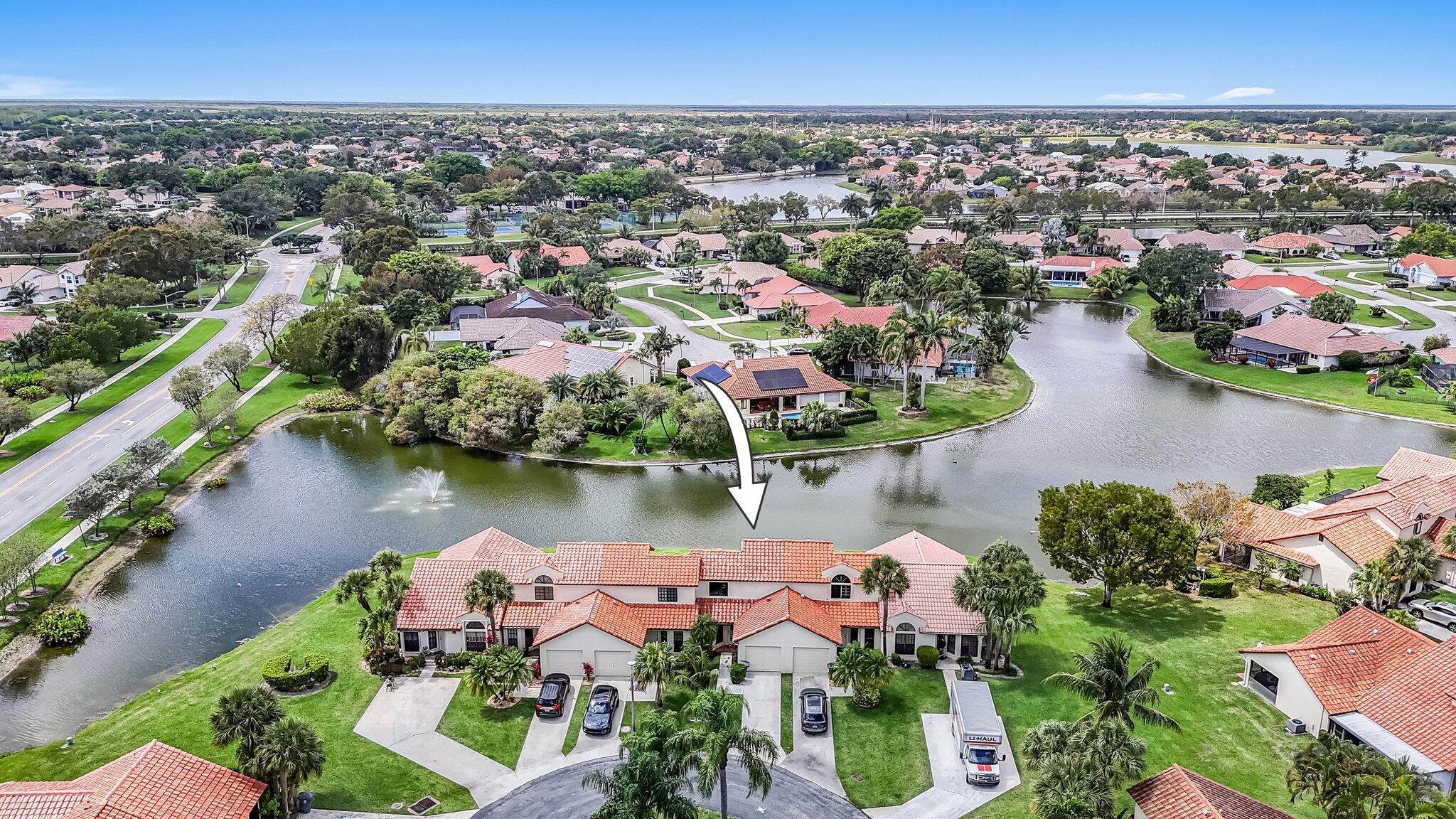 10323 Hidden Springs Court Boca Raton, FL 33498 - Photo 33 of 41 an aerial view of a house with a lake view