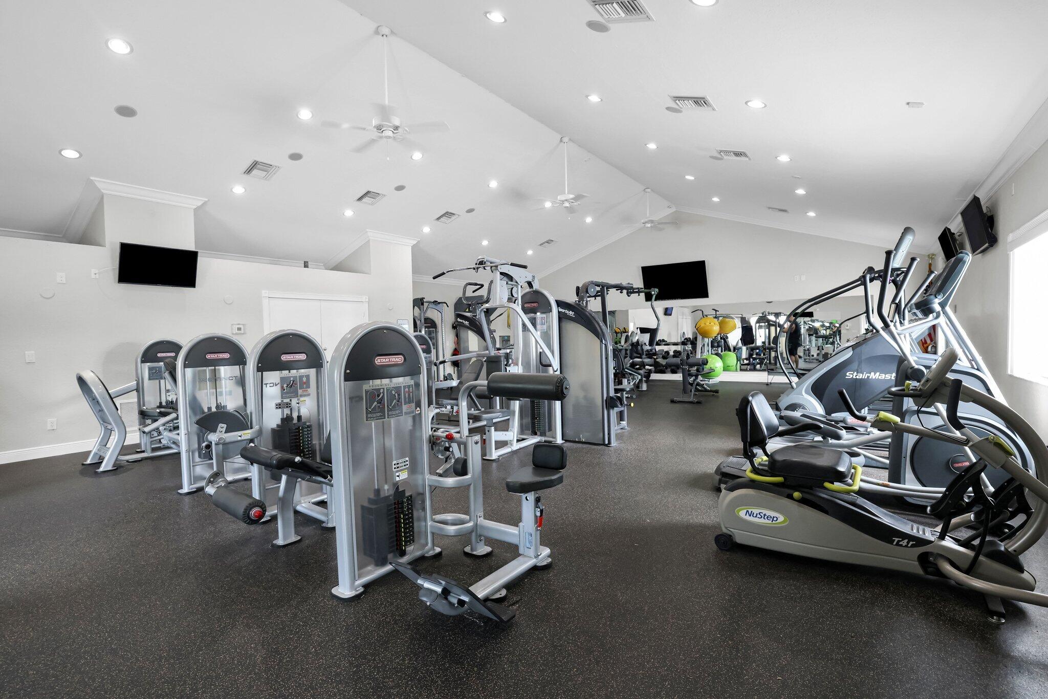 10323 Hidden Springs Court Boca Raton, FL 33498 - Photo 37 of 41 a view of a room with gym equipment
