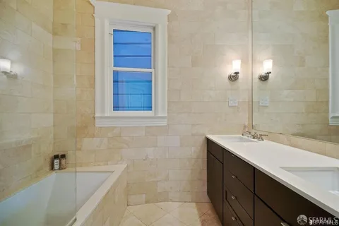 a bathroom with a sink and a bathtub