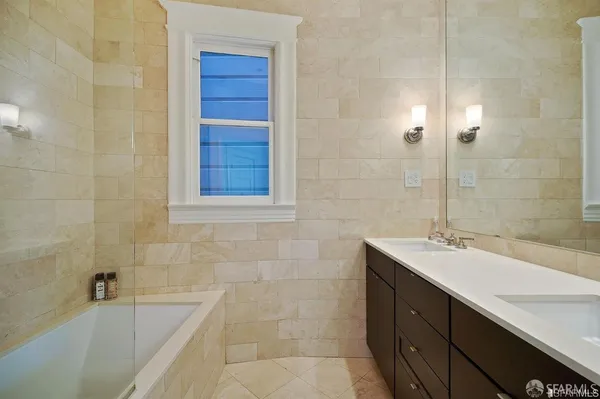 a bathroom with a sink and a bathtub
