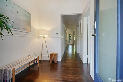 a view of entryway with wooden floor