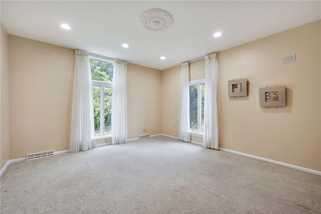 1001 Osage Road Pittsburgh, PA 15243 - Photo 20 of 42 an empty room with windows and closet
