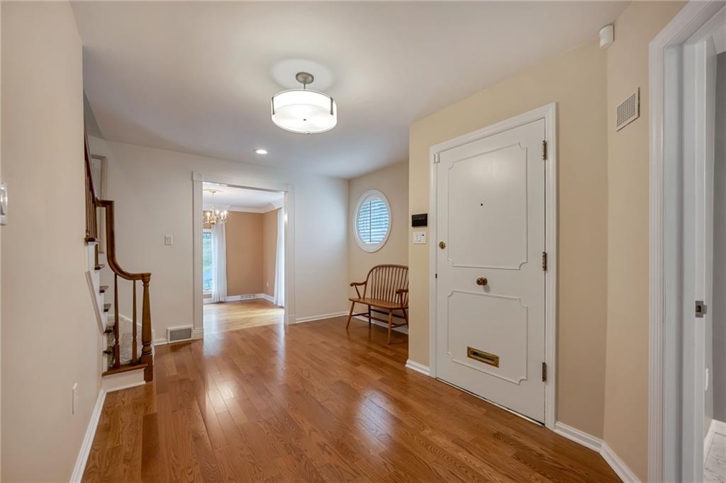 1001 Osage Road Pittsburgh, PA 15243 - Photo 2 of 42 wooden floor in an empty room with a window