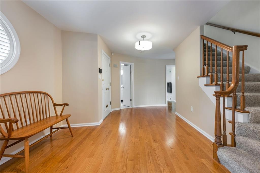 1001 Osage Road Pittsburgh, PA 15243 - Photo 3 of 42 a view of empty room with wooden floor and fan