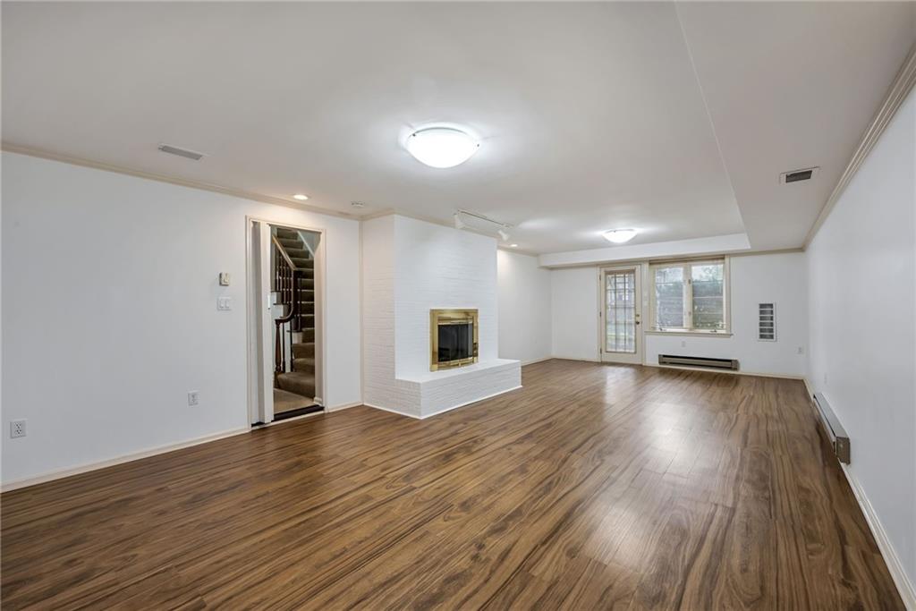 1001 Osage Road Pittsburgh, PA 15243 - Photo 34 of 42 a view of an empty room with wooden floor and a window