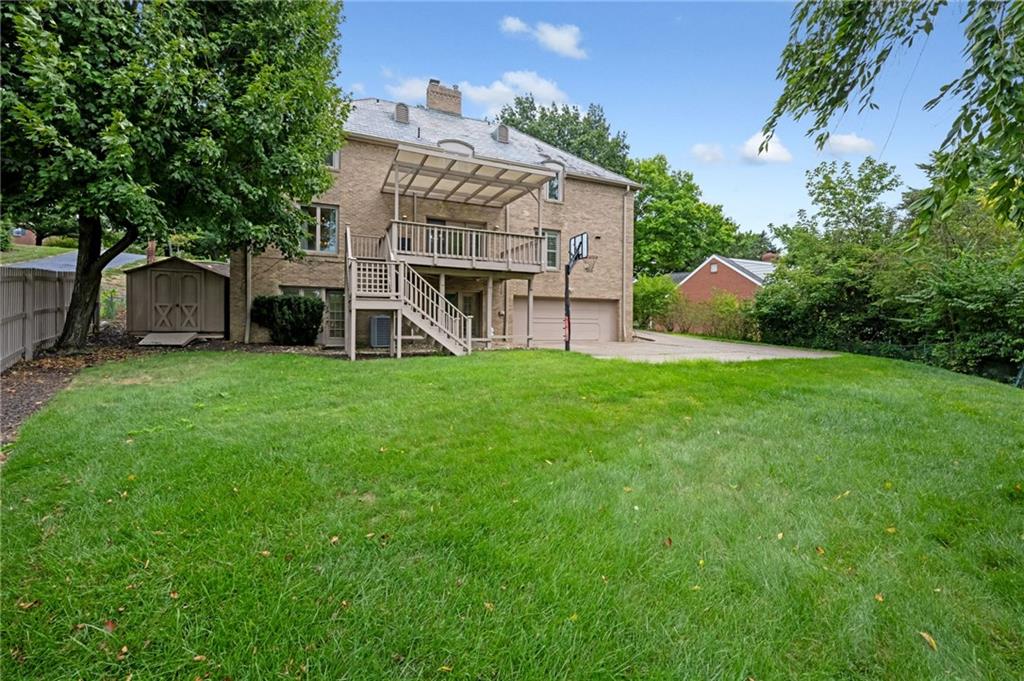 1001 Osage Road Pittsburgh, PA 15243 - Photo 42 of 42 a view of a house with backyard and a tree