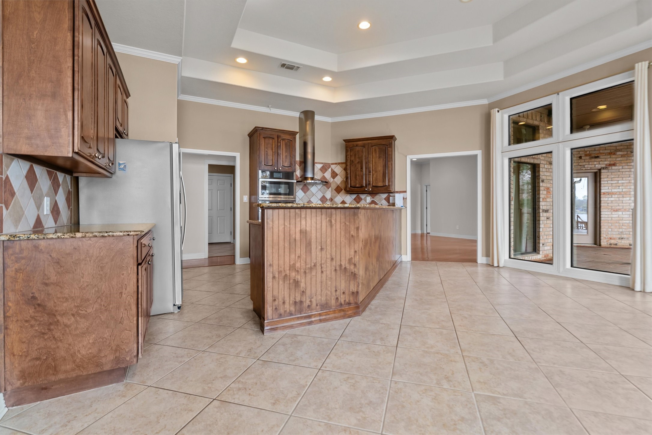 341 Lakeview Drive Grapeland, TX 75844 - Photo 12 of 31 a view of kitchen with refrigerator and cabinets