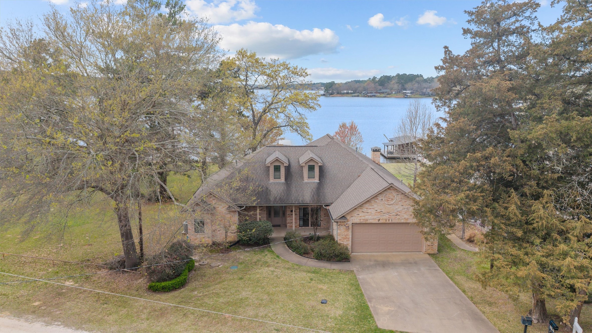 341 Lakeview Drive Grapeland, TX 75844 - Photo 2 of 31 a front view of a house with a yard