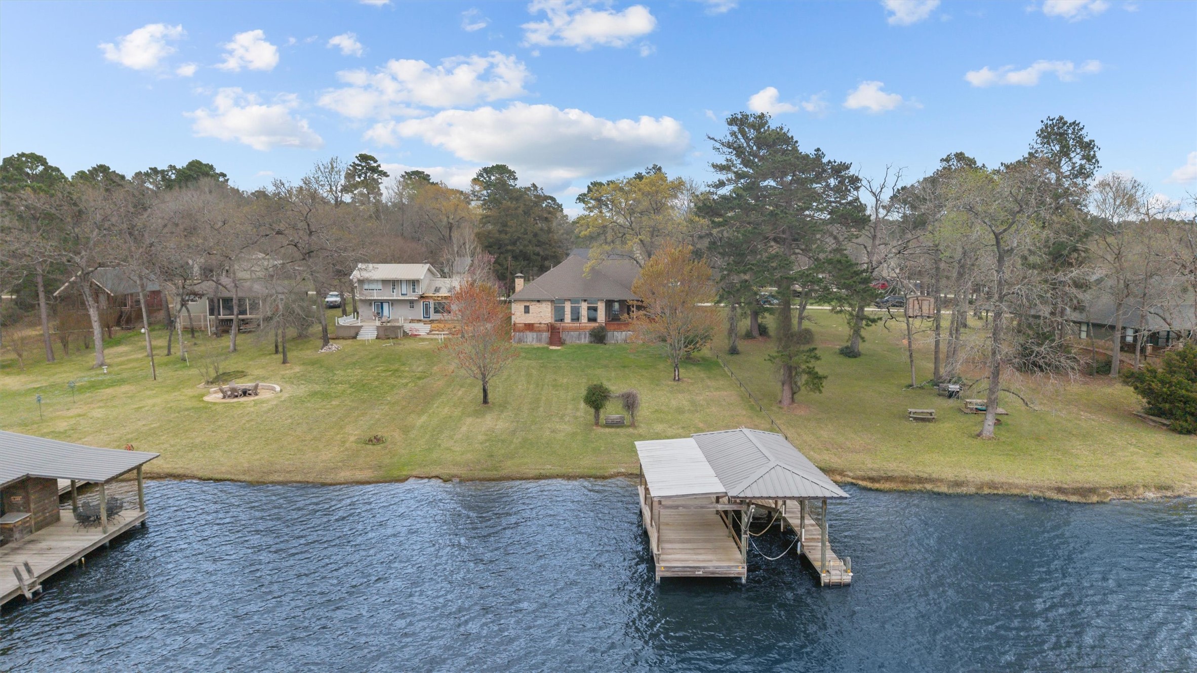 341 Lakeview Drive Grapeland, TX 75844 - Photo 29 of 31 a view of a swimming pool with a yard and furniture