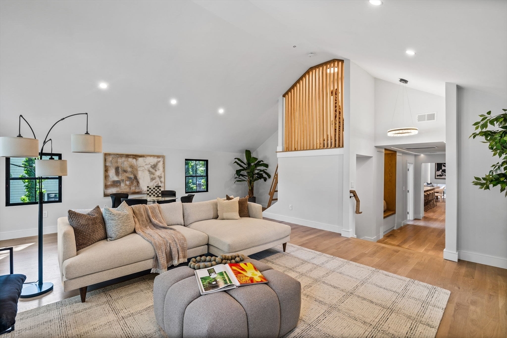 70 Birch Hill Road Belmont, MA 02478 - Photo 11 of 38 a living room with furniture and a large window