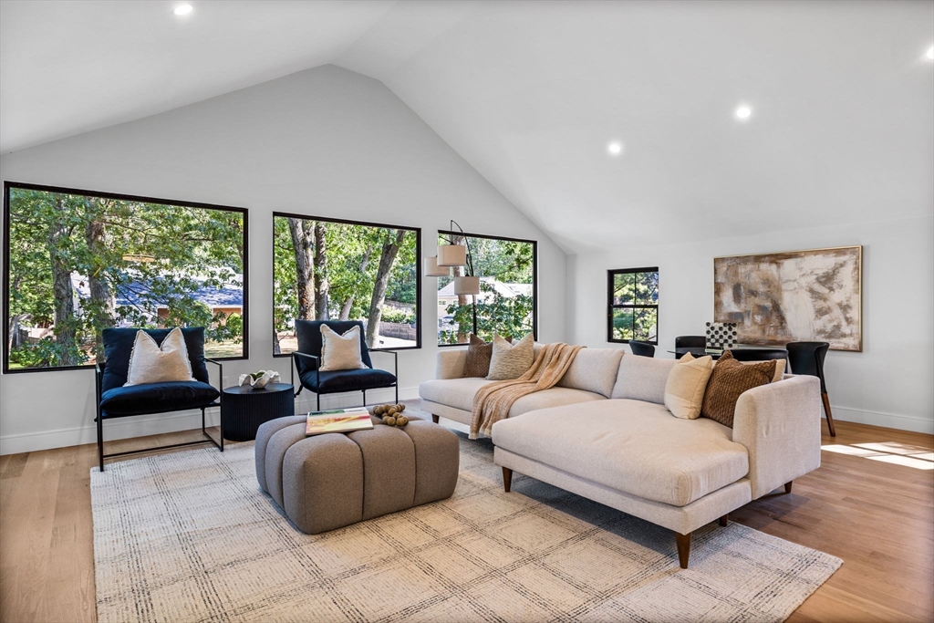 70 Birch Hill Road Belmont, MA 02478 - Photo 12 of 38 a living room with furniture and a large window