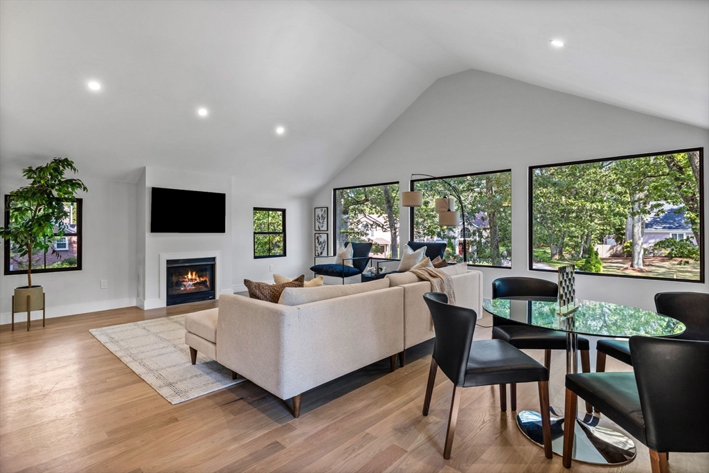 70 Birch Hill Road Belmont, MA 02478 - Photo 13 of 38 a living room with fireplace furniture and a large window