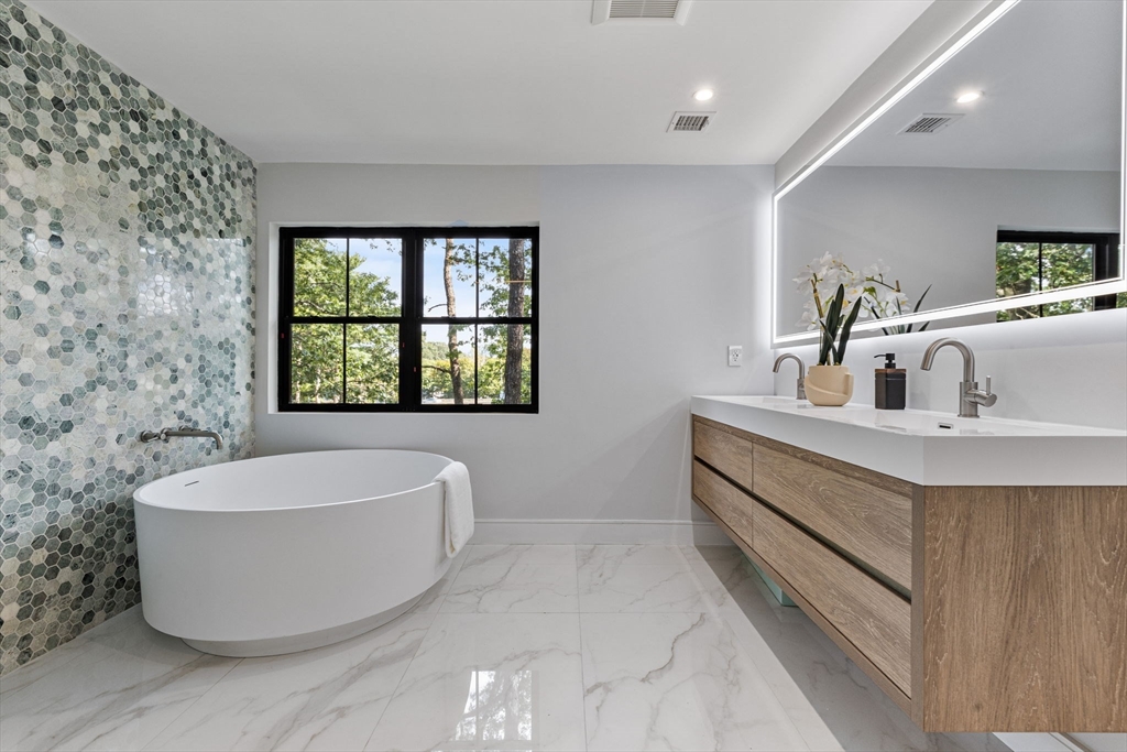 70 Birch Hill Road Belmont, MA 02478 - Photo 25 of 38 a bathroom with a bathtub and a sink