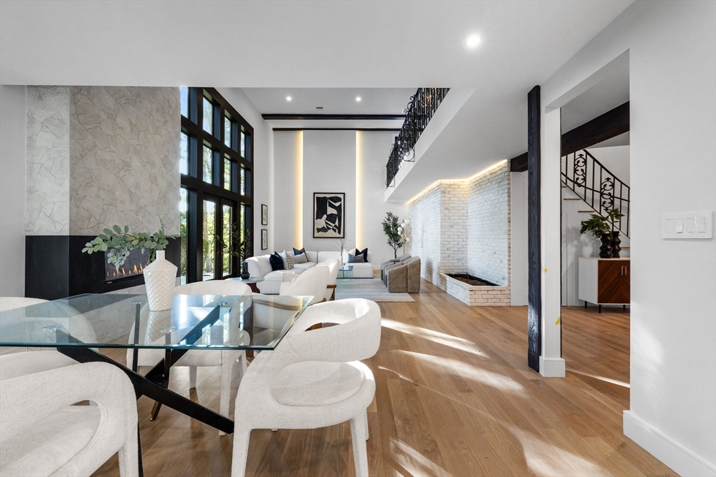 70 Birch Hill Road Belmont, MA 02478 - Photo 8 of 38 a living room with furniture and a large window