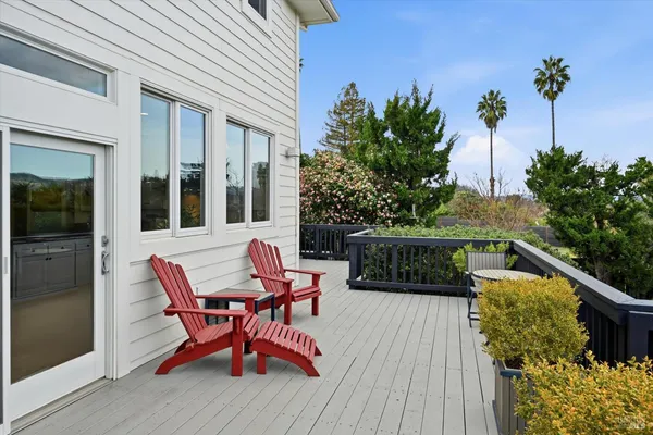 a view of balcony with furniture