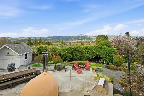 a view of a terrace with sitting area