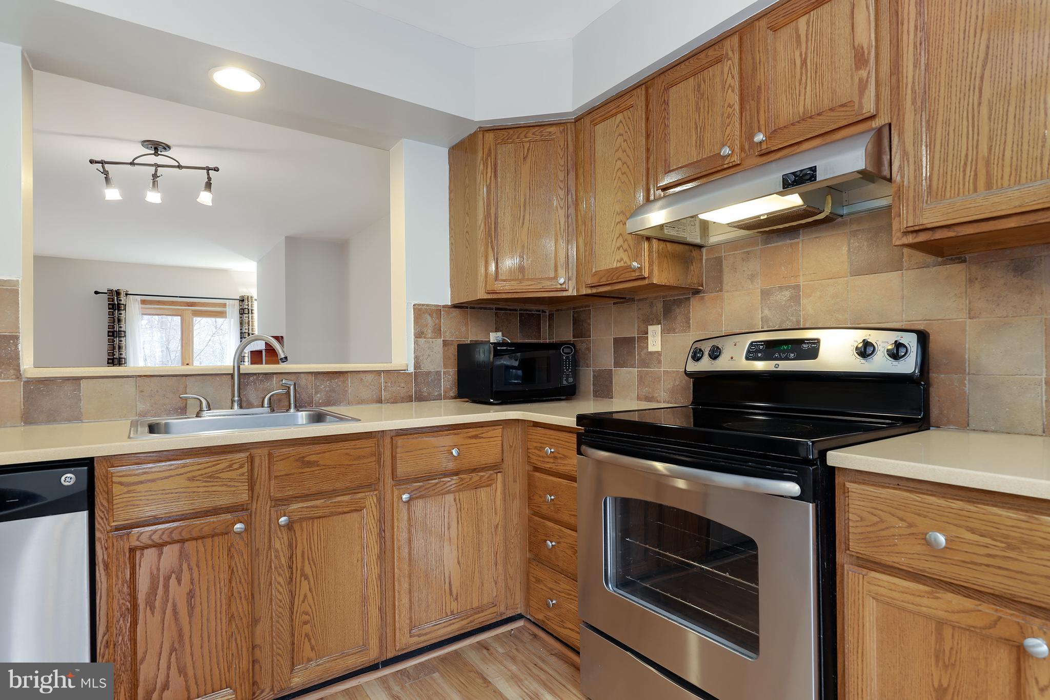6157 Good Hunters Ride Columbia, MD 21045 - Photo 8 of 31 Custom opening to the living and dining area