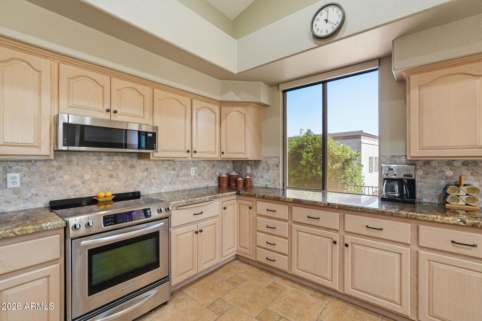 18809 East Avenida Del Ray Rio Verde, AZ 85263 - Photo 13 of 48 a kitchen with granite countertop white cabinets white stainless steel appliances with a sink and dishwasher