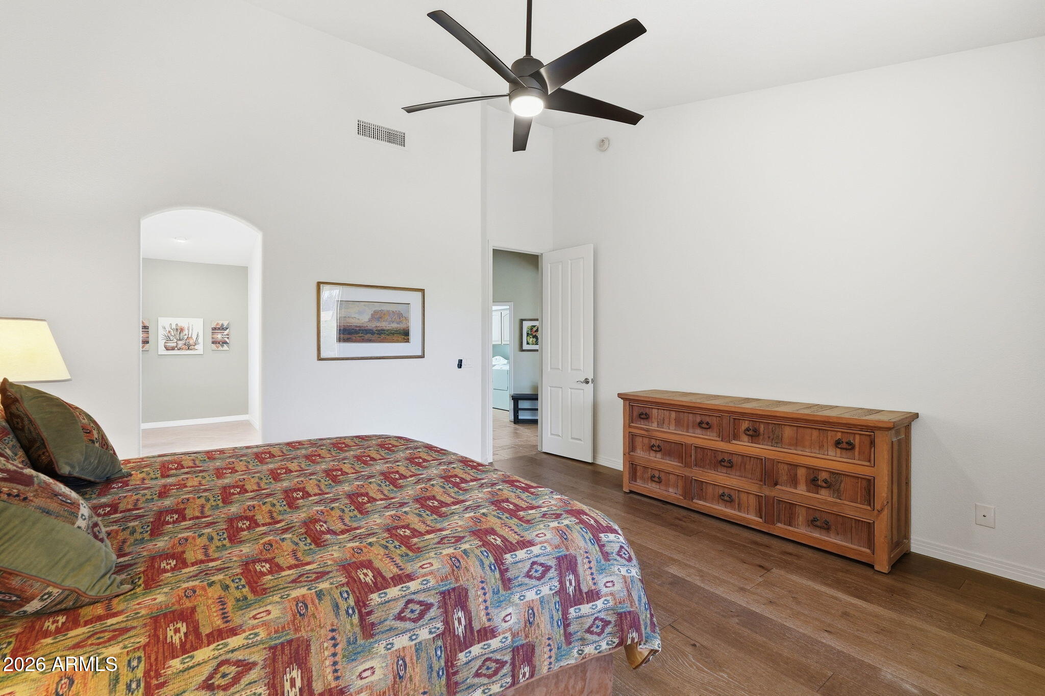 18809 East Avenida Del Ray Rio Verde, AZ 85263 - Photo 16 of 48 a bedroom with a bed and a dresser