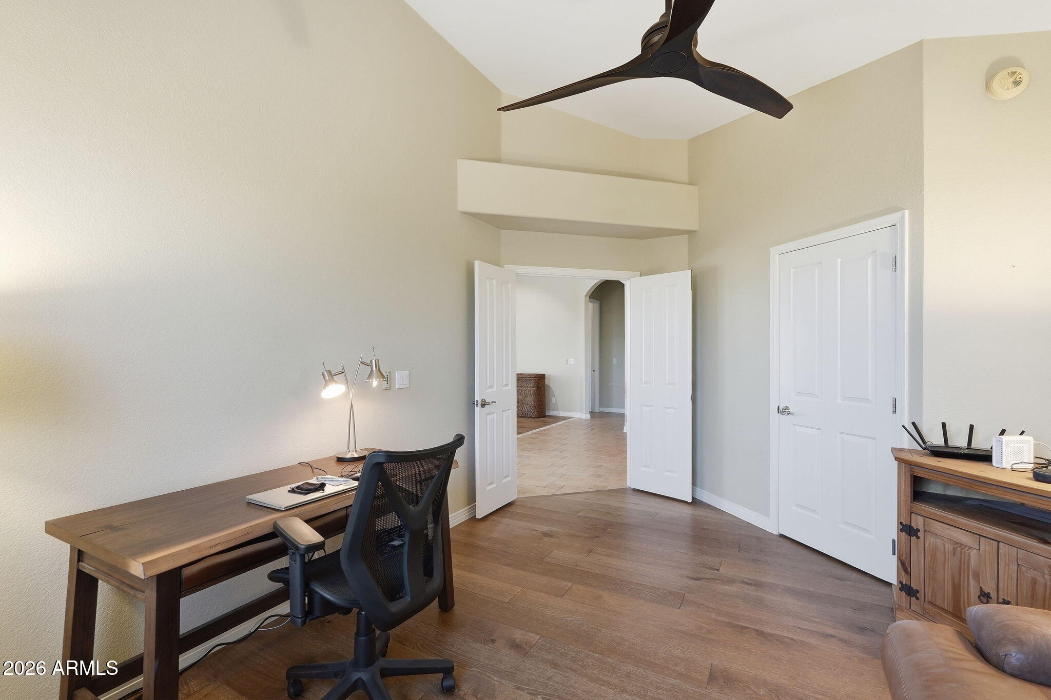 18809 East Avenida Del Ray Rio Verde, AZ 85263 - Photo 23 of 48 a workspace with furniture and chandelier