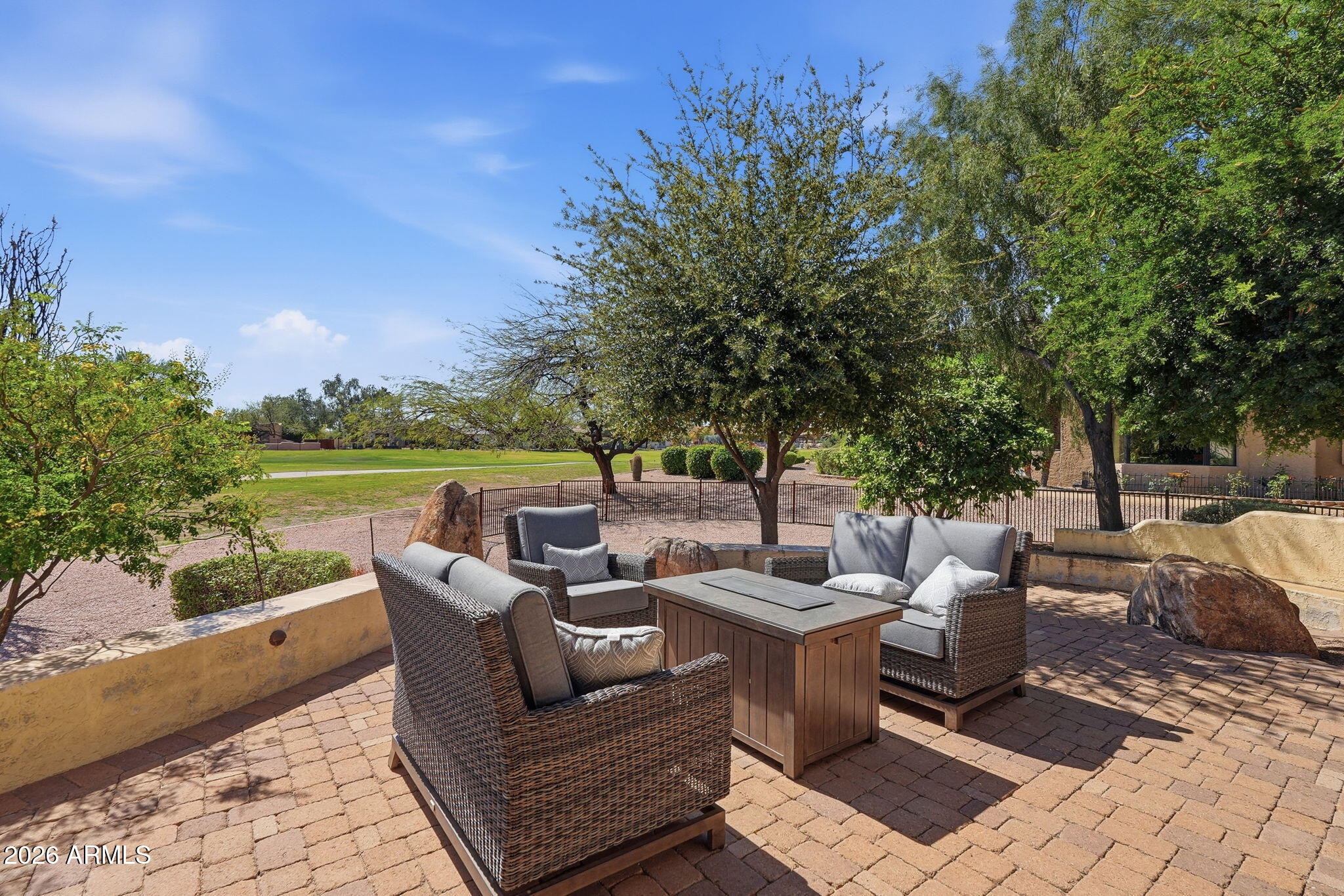 18809 East Avenida Del Ray Rio Verde, AZ 85263 - Photo 26 of 48 a view of a patio with couches potted plants and a big yard