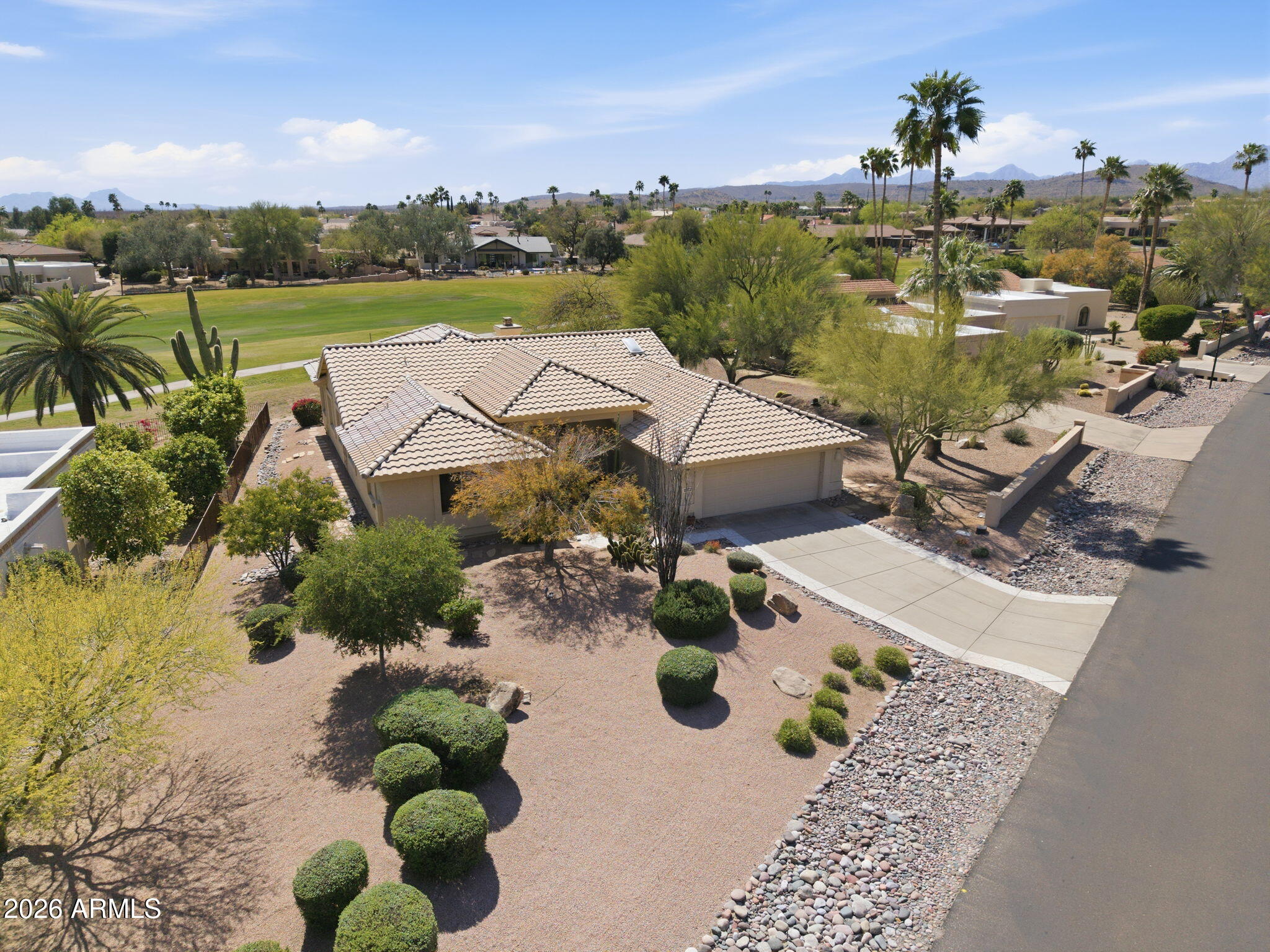 18809 East Avenida Del Ray Rio Verde, AZ 85263 - Photo 2 of 48 a view of a terrace with a table and chairs
