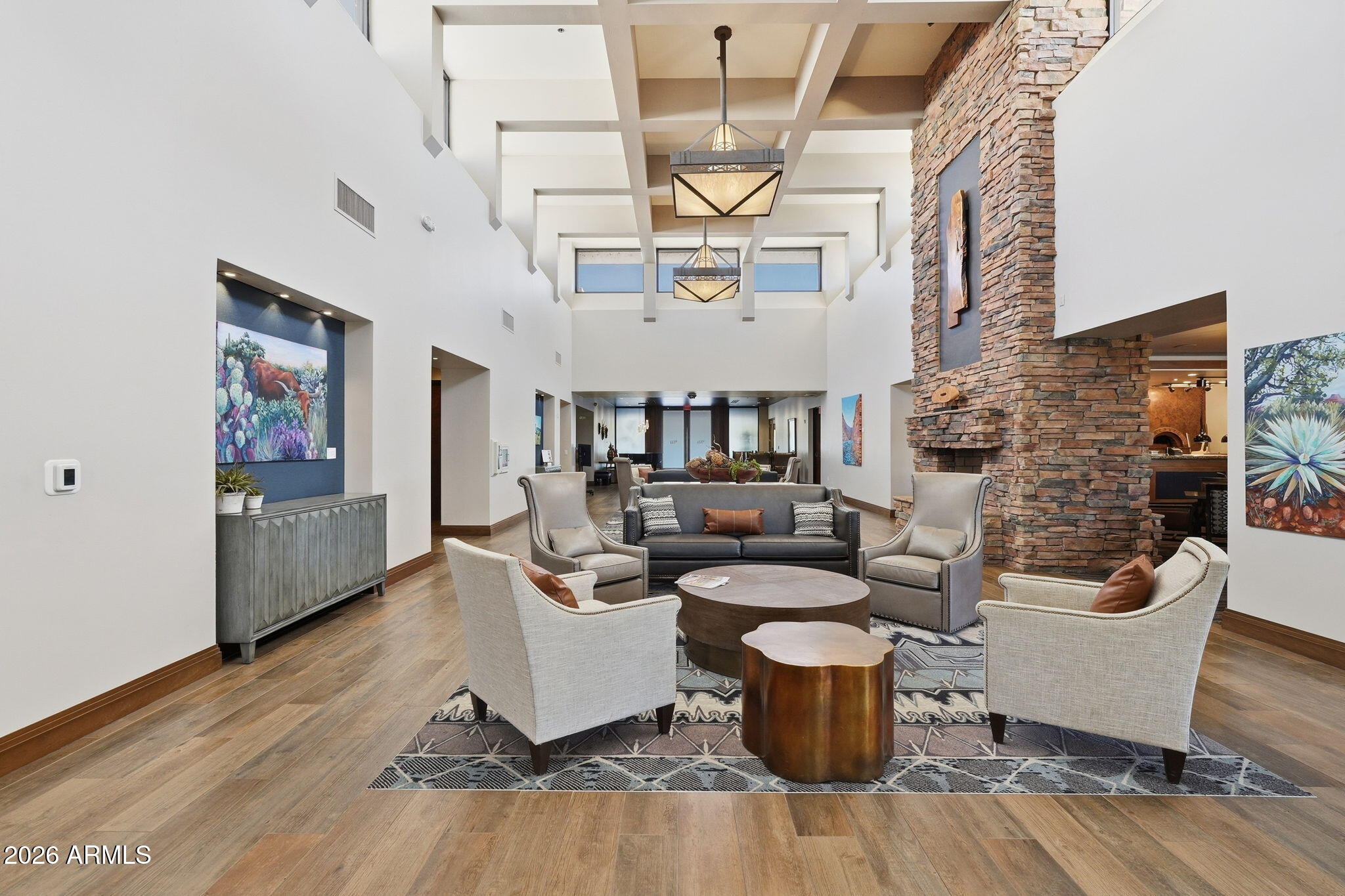 18809 East Avenida Del Ray Rio Verde, AZ 85263 - Photo 32 of 48 a living room with furniture and a fireplace