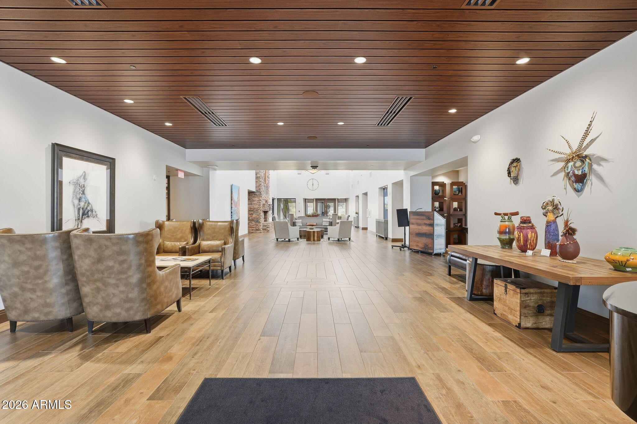 18809 East Avenida Del Ray Rio Verde, AZ 85263 - Photo 35 of 48 a living room with furniture and a wooden floor