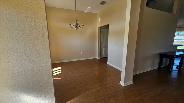 a view of a livingroom with a hardwood floor