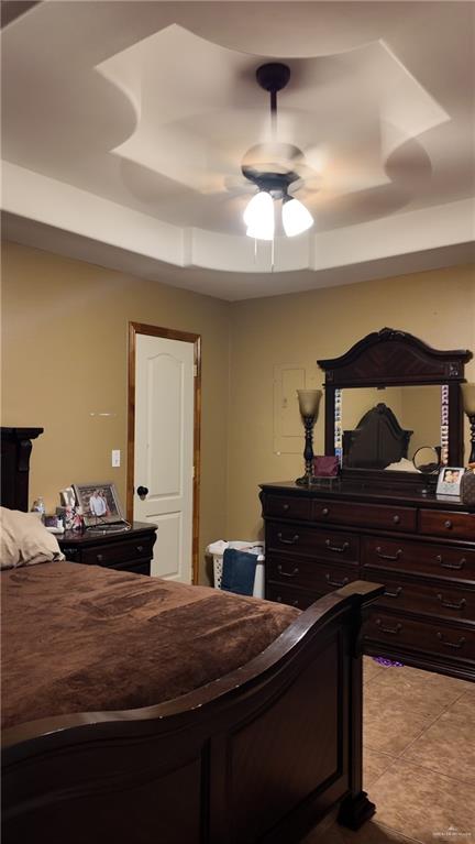 191 Teodora Drive Rio Grande City, TX 78582 - Photo 26 of 45 a bedroom with a bed and a chandelier