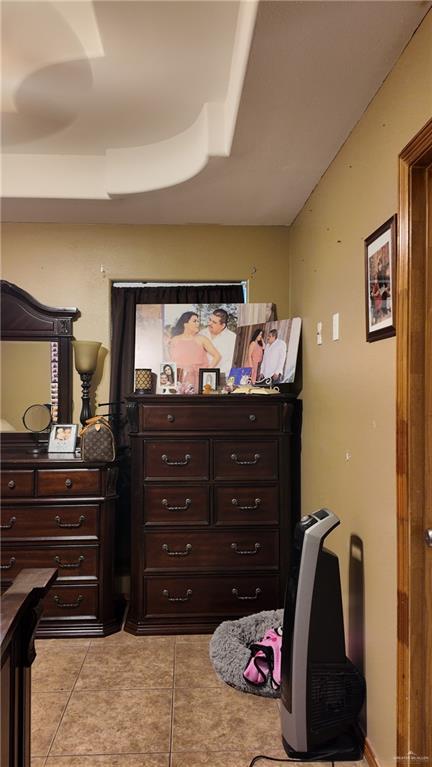 191 Teodora Drive Rio Grande City, TX 78582 - Photo 27 of 45 a room with a dresser and a television