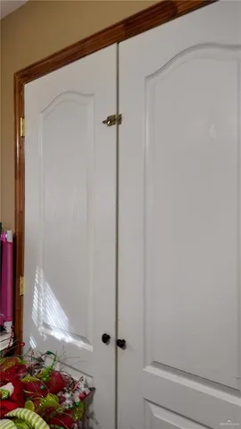 a view of wooden floor with a small space