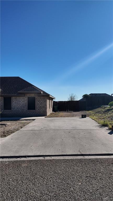 191 Teodora Drive Rio Grande City, TX 78582 - Photo 6 of 45 a front view of a house with a yard