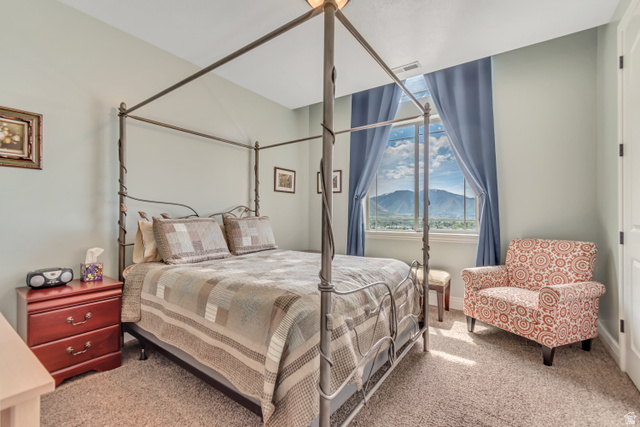 2543 East 700 South Springville, UT 84663 - Photo 36 of 73 Bedroom featuring light colored carpet and a mountain view