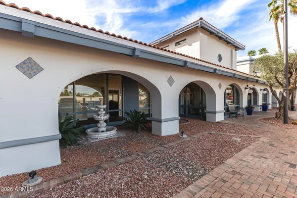 a view of a house with swimming pool