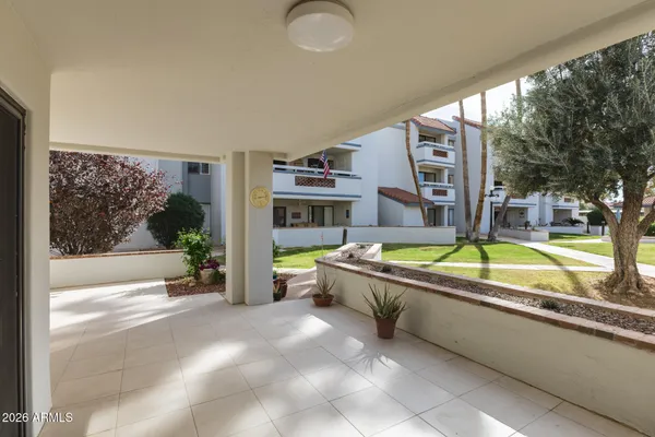 a very nice looking rest room with a large window and swimming pool