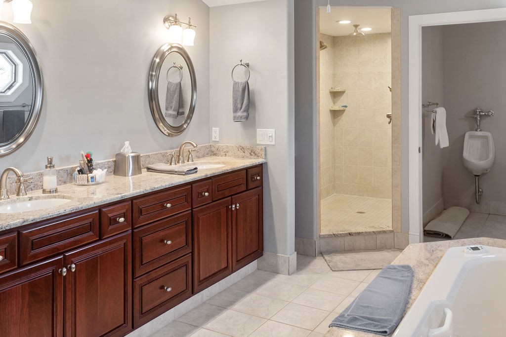 758 Holt Road Lebanon, TN 37087 - Photo 32 of 55 a spacious bathroom with a double vanity sink and a mirror