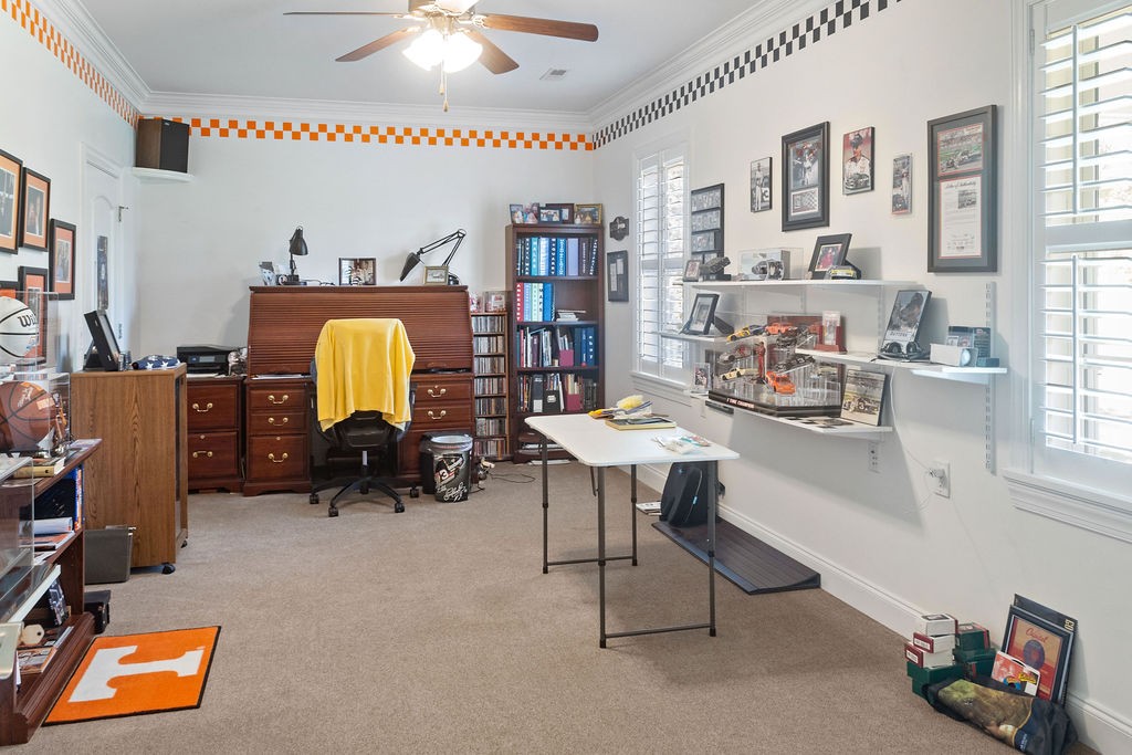 758 Holt Road Lebanon, TN 37087 - Photo 36 of 55 a view of a workspace with furniture and a potted plant