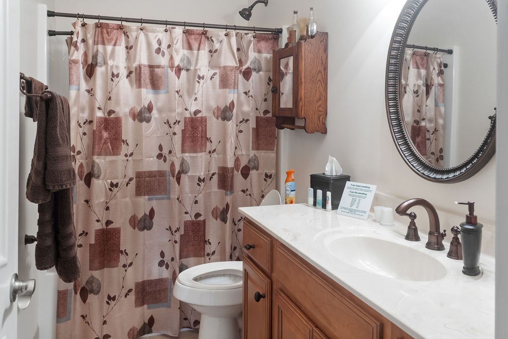 758 Holt Road Lebanon, TN 37087 - Photo 37 of 55 a bathroom with a sink and a mirror
